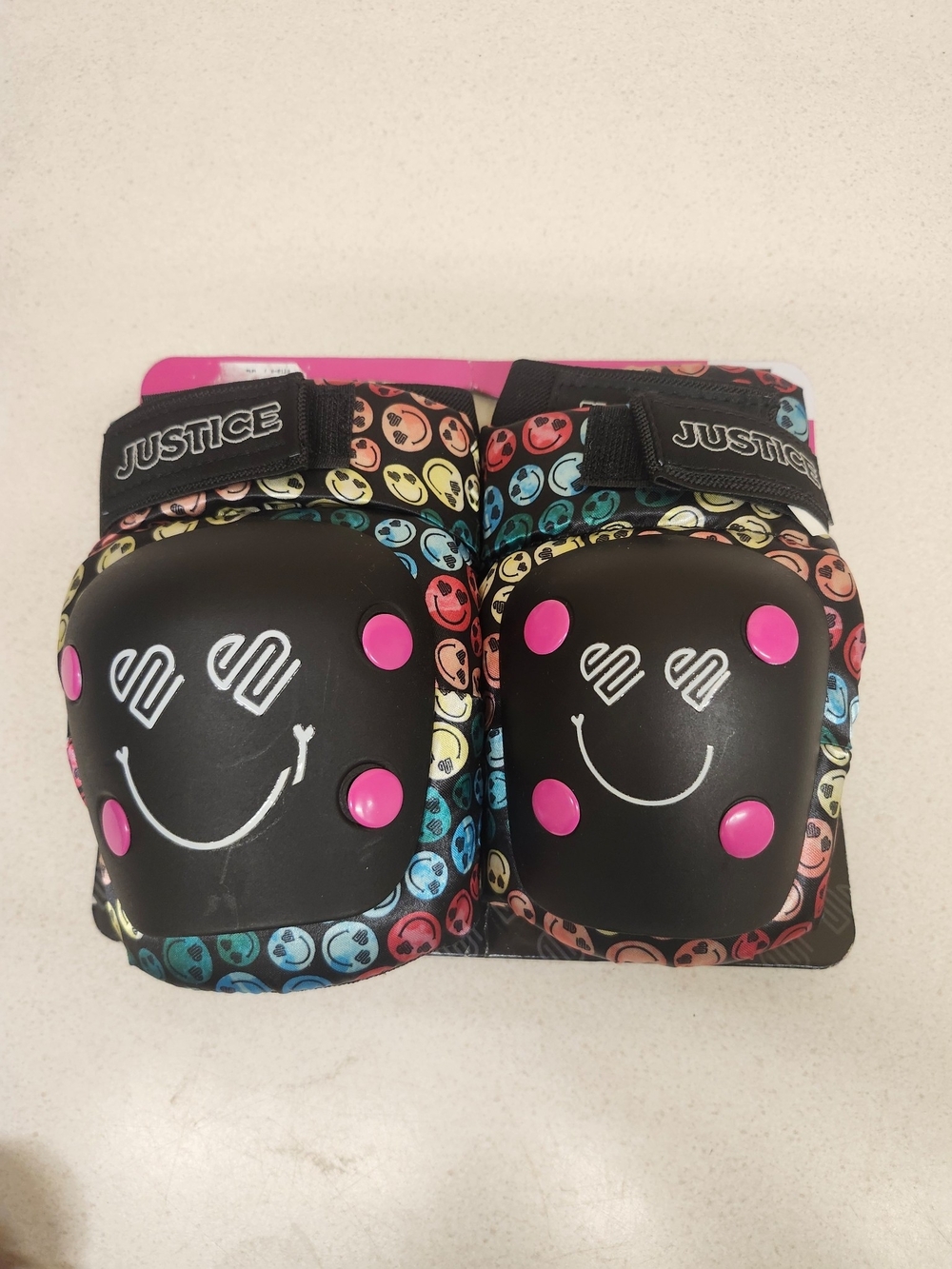 Justice Kids Black Knee Pads with Pink Accents and Multi-Color Smiley Pattern